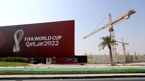 FIFA World Cup 2022 signage next to a bubilding site in Doha, Qatar.