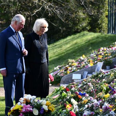 Prince Charles and Camilla, Duchess of Cornwall view floral tributes left for Prince Philip at Marlborough House Gardens