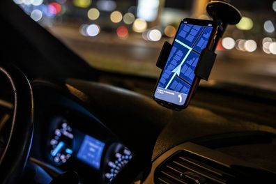 Phone based GPS in a car at night.