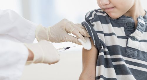 Boy receiving vaccination