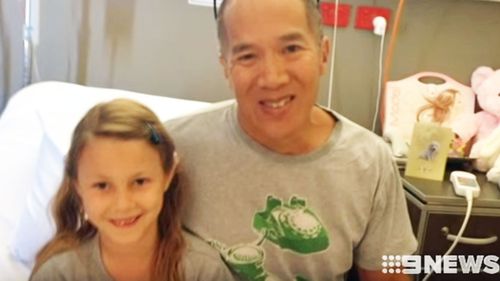 Dr Teo pictured with Courtney in hospital. 