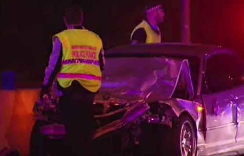 The BMW smashed into two cars after dodging police for a random breath test. (9NEWS)