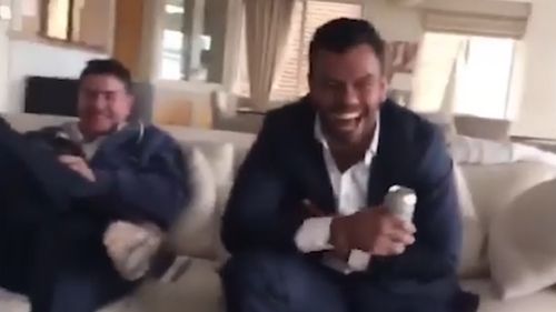 Kurtley Beale and another man are seen with grins on their faces in the video too.