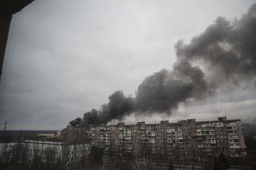 Smoke rise after shelling by Russian forces in Mariupol, Ukraine, Friday, March 4, 2022.