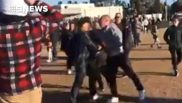 Umpire chased down by crowd at Melbourne junior football match