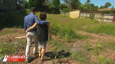 Sydney parents Matt and Grace Slade looking at their vacant block of land.