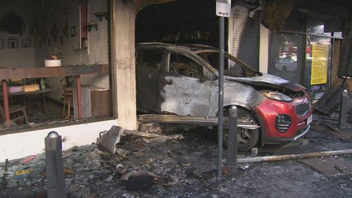 A tobacconist has been partly destroyed after an attempted arson attack and ram raid in Melbourne this morning.