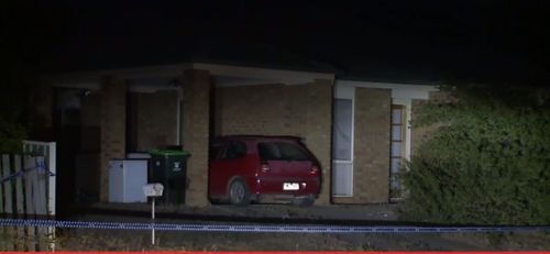 Emergency services found the woman dead when they arrived at the home last night. (9NEWS)