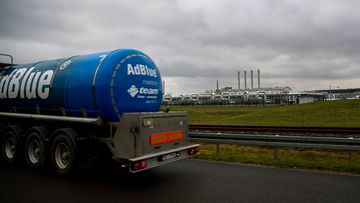 A tanker, operated by AdBlue, passes the Nord Stream 2 gas receiving station in Lubmin, Germany.