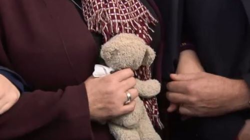 Mrs Cronin clutched a small teddy bear as she spoke. (9NEWS)