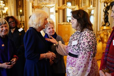 Queen Camilla speaks with Ruth Jones 