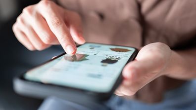 Woman shopping using phone