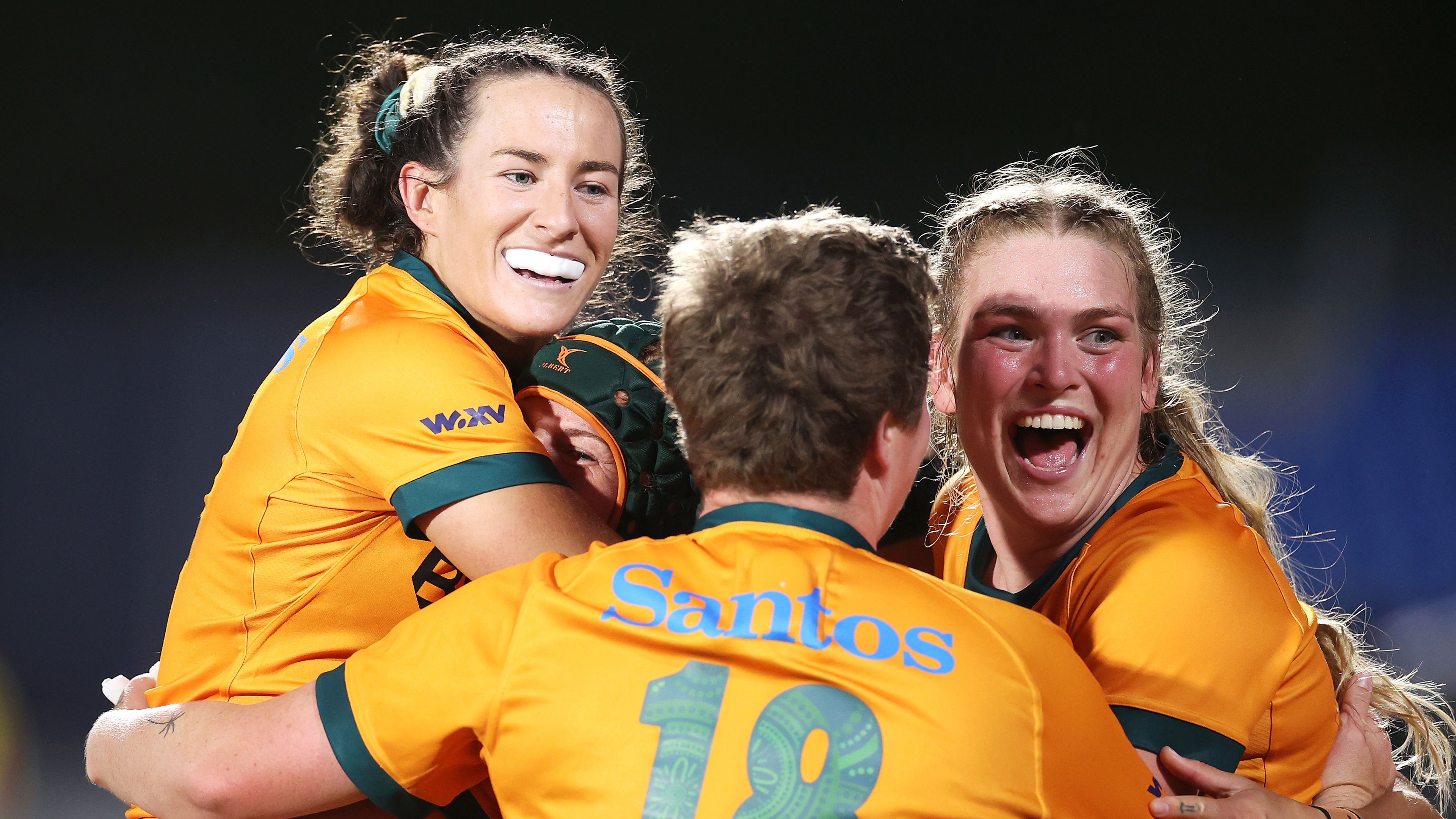 Maya Stewart, Emily Chancellor, Bridie O&#x27;Gorman and Kaitlan Leaney celebrate victory during the WXV1 match between Australia and Wales.
