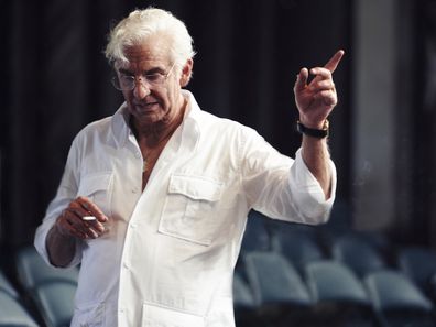 This image released by Netflix shows actor-director Bradley Cooper as Leonard Bernstein in a scene from "Maestro."