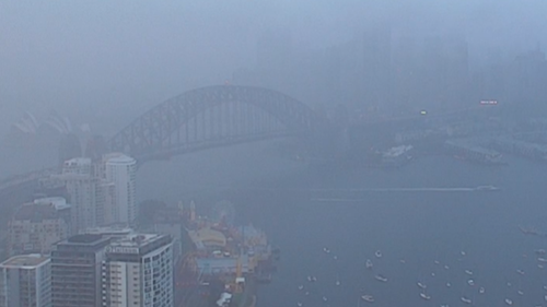 This morning Sydney Harbour was obscured by heavy rain as wet weather made its return. 