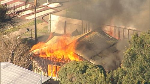 Flames engulfed the home in Beenleigh, Logan, outside of Brisbane. (9NEWS)