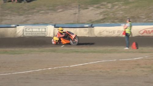 A rider and his passenger were badly injured in a crash during an Adelaide speedway race.