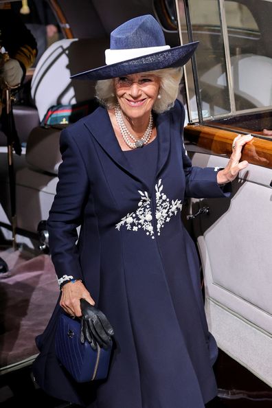Camilla, Duchess of Cornwall arrives at the Sovereign's Entrance ahead of the State Opening of Parliament at Houses of Parliament on May 10, 2022 in London, England.