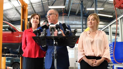 South Australia Premier Jay Weatherill, Labor candidate for Hartley Grace Portolesi (R), and SA Labor MP Kyam Maher at Charles Campbell College Trade School in Paradise. (AAP)