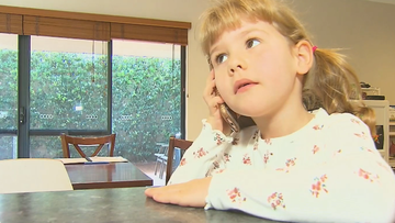 A six-year-old Perth girl has been hailed a hero after she called an ambulance for her mum who had suffered diabetic episode.