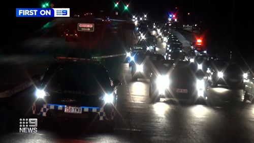 Police swarm a hoon gathering at a Bunnings on the Gold Coast.