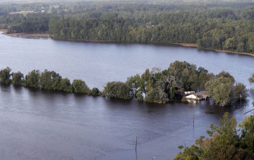 A home is surrounded by floodwaters in Marion, South Carolina.