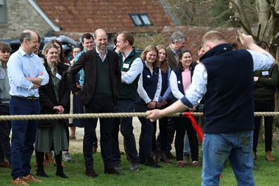 PENSFORD, ENGLAND - MARCH 26: Prince William, Prince of Wales watches a tug of war as he attends an event for sixty of the Duchy of Cornwall's next generation of farming tenants, on March 26, 2025 in Pensford, England (Photo Darren Staples - WPA Pool/Getty Images)