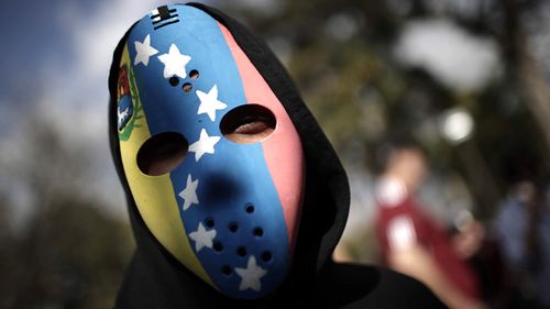 Protester supports the self-proclaimed President of Venezuela, Juan Guaido, against the government of President Nicolas Maduro.