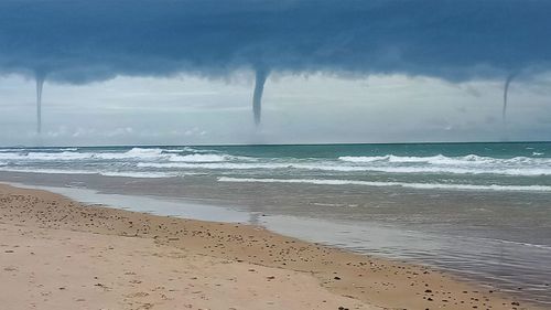 Waterspouts formed over Old Bar Beach on the NSW mid-north coast this afternoon.