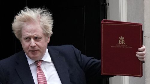 Britain's Prime Minister Boris Johnson leaves 10 Downing Street, to head to the House of Commons. 
