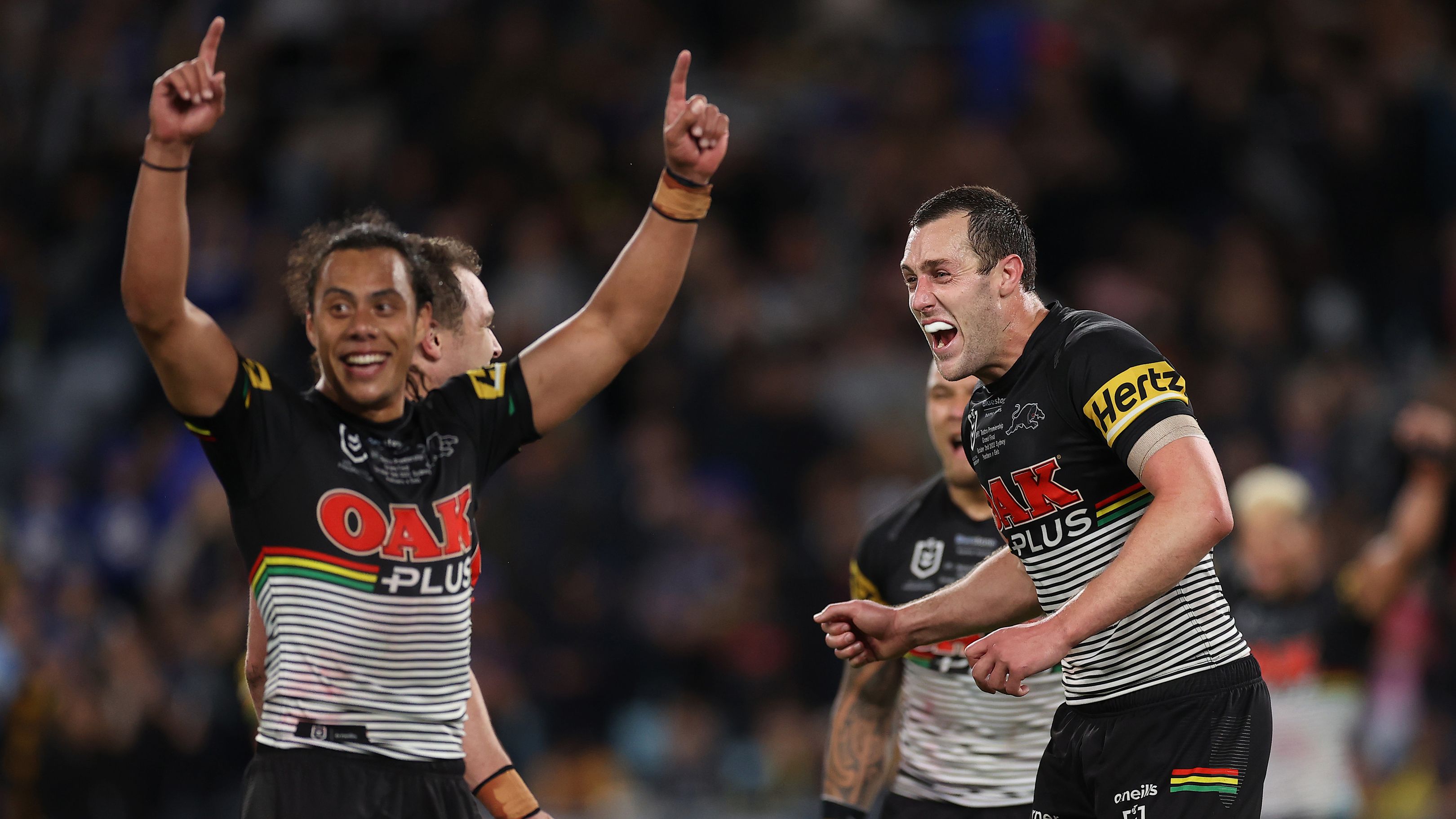 Isaah Yeo and Jarome Luai of the Panthers celebrate victory during the 2022 NRL Grand Final match between the Penrith Panthers and the Parramatta Eels at Accor Stadium on October 02, 2022, in Sydney, Australia. (Photo by Mark Kolbe/Getty Images)