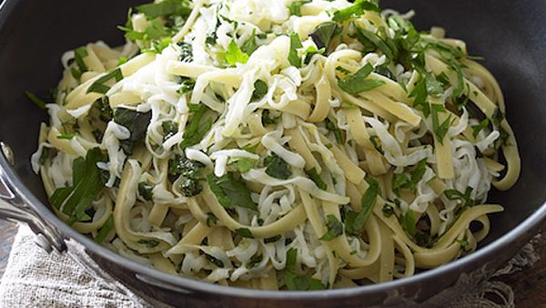 Wok-tossed tagliatelle squid with fresh herbs and lemon