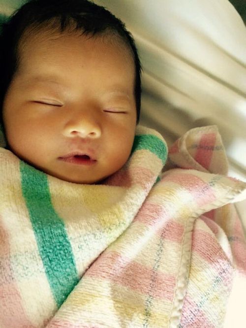 A Facebook image obtained Thursday, Jan. 7, 2016 of two-month-old baby Qianqian "Queenie" Xu. The two-month-old died in hospital shortly after police swooped on a Parkinson home and found the baby, her mother Yuanyuan Cao and grandparents all seriously injured with knife wounds. The girl's grandfather is under police guard at Princess Alexandra Hospital. (AAP Image/Facebook) 