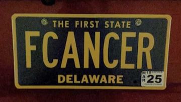 A US woman has won a legal battle after her customised number plate was banned by road authorities.