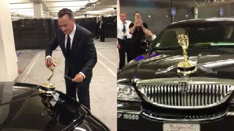 Watch: Tom Hanks pimps his ride by sticky-taping his Emmy to the hood