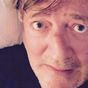 Stephen Fry rushed to hospital after falling six feet off stage