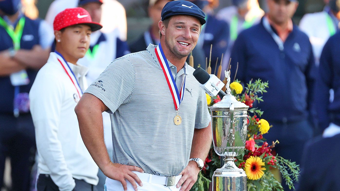 Champion Bryson DeChambeau of the United States speaks during the trophy ceremony 