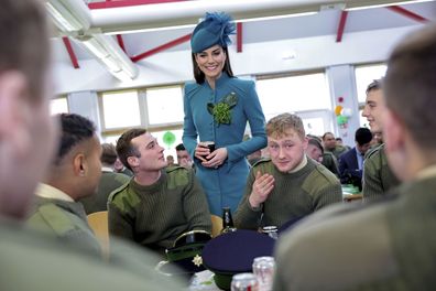 Kate, the Princess of Wales meets with members of the Irish Guards during a visit to the 1st Battalion Irish Guards for the St. Patrick's Day Parade at Mons Barracks, in Aldershot, England, Friday, March 17, 2023.