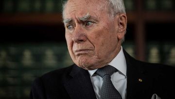 Former Prime Minister John Howard honours the Queen after her death at a press conference.