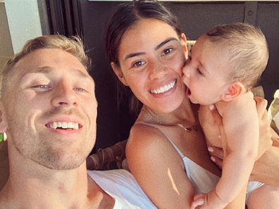 Shanelle and Bryce Cartwright with child