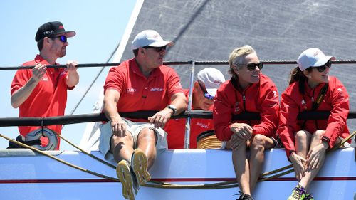 Crown Prince Frederik (far left) and Princess Mary of Denmark (second right) are seen aboard Wild Oats XI during the CYCA SOLAS Big Boat Challenge. (AAP)