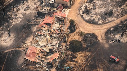 Property damaged by the East Gippsland fires in Sarsfield, Victoria, Wednesday, January 1, 2019. More than half a million hectares have been burnt in Victoria's destructive East Gippsland fires