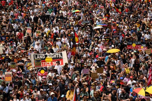 SYDNEY, AUSTRALIA - JANUARY 26: Protesters gather at Central Station on January 26, 2026 in Sydney, Australia. Australia Day, formerly known as Foundation Day, is the official national day of Australia and is celebrated annually on January 26 to commemorate the arrival of the First Fleet to Sydney in 1788. Many indigenous Australians refer to the day as 'Invasion Day' and there is a small but growing movement to change the date amid broader debate on the day's significance. This year's commemora