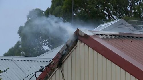 The roof of a Blacktown home caught ablaze following the storm. (9NEWS)