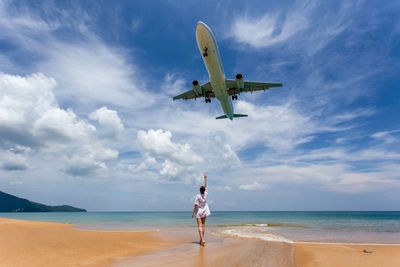 Planes over Mai Khao Beach in Phuket, Thailand 