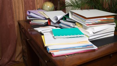 Cluttered desk at home. 