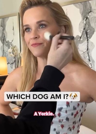 Reese Witherspoon chats dog breeds while getting her makeup done.