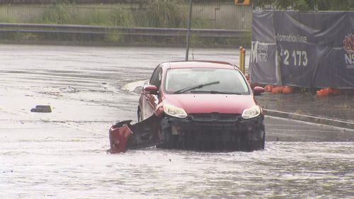 Streets across Sydney have been inundated by floodwaters as many of the city's suburbs recorded their wettest day in almost a year.