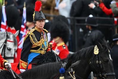 LONDON, ENGLAND - MAY 06: Princess Anne, Princess Royal rides on horseback behind the gold state coach carrying the newly crowned King and Queen Consort as they travel down The Mall during the Coronation of King Charles III and Queen Camilla on May 06, 2023 in London, England. The Coronation of Charles III and his wife, Camilla, as King and Queen of the United Kingdom of Great Britain and Northern Ireland, and the other Commonwealth realms takes place at Westminster Abbey today. Charles acceded 