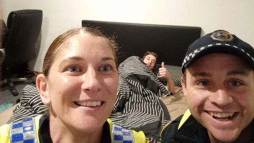 Police officers tuck drunk Tasmanian man into bed then take a selfie with him